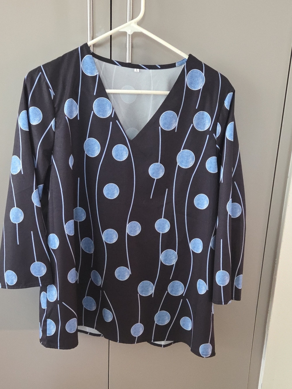 Black Long-Sleeve V-Neck Top with Blue Dot Print
